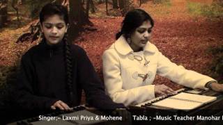 Harmonium Lessons Singer Laxmi Priya amp Mohene with Manohar Das Website wwwkrishnarockcom [upl. by Atteuqaj]