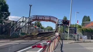 High pitched alarm amp old GWE barriers Bedhampton level crossing Hampshire [upl. by Einwahs290]