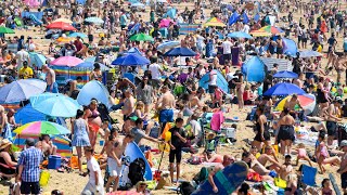 Britons enjoy Bank Holiday sunshine on hottest day of the year so far [upl. by Aihsemak]