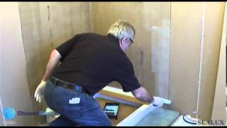 Tanking shower walls and fitting a Sealux Trim [upl. by Ahselrac]