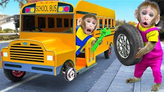 KiKi Monkey pretends to be a fake Car Mechanic fix School Bus Wheel on the road  KUDO ANIMAL KIKI [upl. by Atinhoj566]