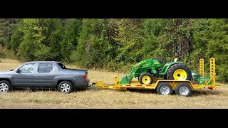 Honda Ridegeline Towing heavy tractor 7000lbs [upl. by Annoyt]