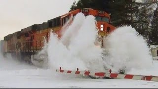 BNSF Train Crashes Through Big Snowdrift [upl. by Anilat]