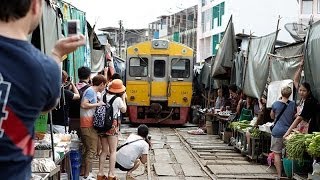 Maeklong Railway Market  Bangkok Thailand [upl. by Skyler353]