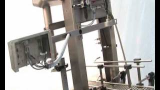 Serac  Semiautomated filling and capping machine [upl. by Enicnarf]