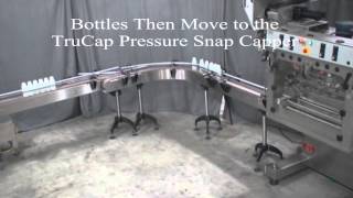 Bottle Unscrambler Pressure Overflow Liquid Filler amp Inline Screw Capper by Acasi Machinery [upl. by Lorrad]