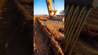 The process of loosening the soil with an excavator rake [upl. by Netti]