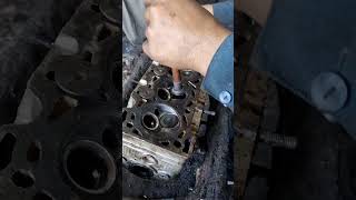 Engine cylinder head valve lapping work [upl. by Trevethick]