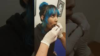 Getting my cheeks piercings over scar tissue painful [upl. by Sille]