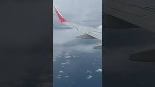 Flying above the Laccadive Sea ocean clouds flight flying Sea [upl. by Hceicjow982]