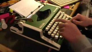 Olympia Traveller De Luxe typewriter [upl. by Lahcsap]