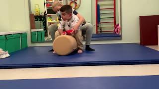 NDT therapy to a quadriplegic dystonic child with CP Roll therapy for sitting position [upl. by Lovett126]