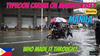 🇵🇭 Manila Vehicles and people go by as Typhoon Carina Gaemi hits Mabini Street in Manila Ermita [upl. by Nitsyrc]