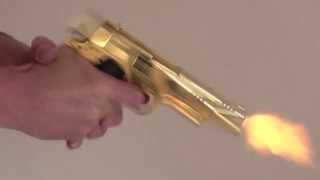 Firing a UMAREX Colt Government 1911 A1 Gold [upl. by Lletnohs]