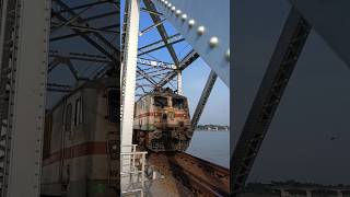 WAP7 🚂 fast Indian 🇮🇳 train 🚂 crossing ❌ the bridge 🌉 shorts 🔥 indianrailways therailwayboyneeraj [upl. by Nirroc]