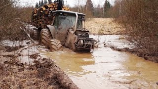 Valtra forestry tractor logging in wet conditions [upl. by Htiffirg]