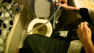 Quadriplegic Draining a Urine Bag Indoors [upl. by Ehcropal]