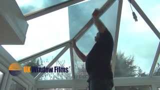 Installing window film on a shaped glass conservatory roof [upl. by Sender]