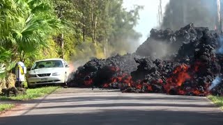 Dramatic timelapse footage shows lava engulfing car in Hawaii [upl. by Oirottiv]