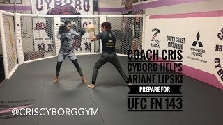 Cris Cyborg holds pads for Ariane Lipski ahead of UFC FN 143 [upl. by Ehr727]