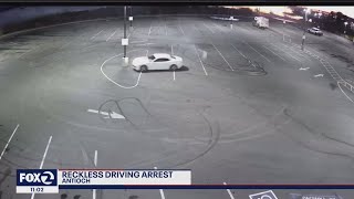 Reckless driver hits light pole while doing donuts [upl. by Raasch]