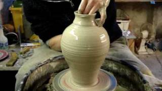 Making Throwing a Pottery Greek Roman Amphora Vase on the wheel [upl. by Eniortna]