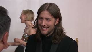 Ludwig Goransson talks about composing quotOppenheimerquot score on Oscars red carpet [upl. by Farrington484]