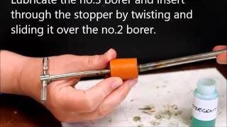 Inserting tubing through a stopper [upl. by O'Connor]