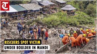 Rescuers spot victim under boulder in Rajban village in Himachal Pradesh’s Mandi after cloudbursts [upl. by Weston603]