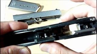 Replacing The Magazine Release Button On A Kahr Pistol [upl. by Anifesoj131]