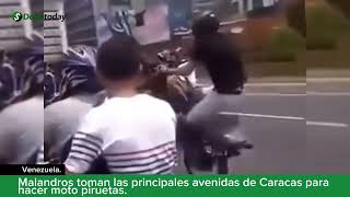 Malandros toman las principales avenidas de Caracas para hacer moto piruetas [upl. by Namara]