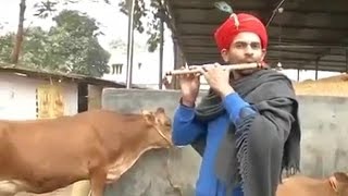 Watch  Bihar minister Tej Pratap Yadav dresses up as Krishna plays flute [upl. by Walworth107]