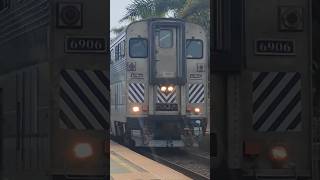 AMTK 6906 Point Dume leads Amtrak 777 through Carlsbad Village CA on 112724 [upl. by Poliard]