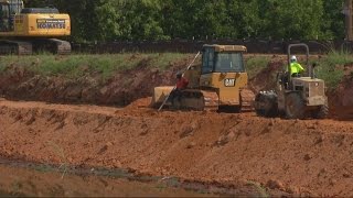 Drained canal allows work on bank as well as bridge [upl. by Baugh]