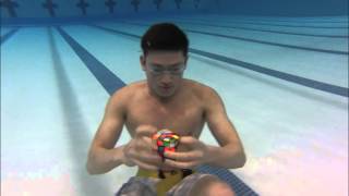 3 Rubiks cubes solved Underwater in 1 minute [upl. by Asiret]