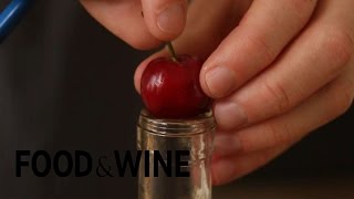 How to Pit Cherries with Chopsticks  Mad Genius Tips  Food amp Wine [upl. by Nirrat]