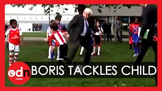 Boris Johnson trips child during football match [upl. by Shepherd]