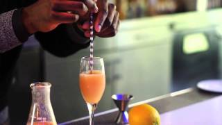 How to Make a Bellini  Mixology Tips [upl. by Faythe835]