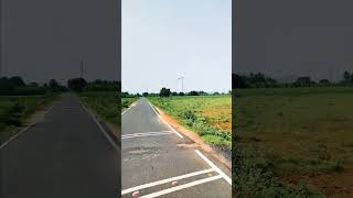 Windmills near road🍃🌬️ windmills roadtrip windmillfarm farming shorts trending viralvideo [upl. by Aietal]