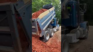 One of our Peterbilt dump trucks dumping a load in a tight spot peterbilt dumptruck dirt [upl. by Aitsirt279]