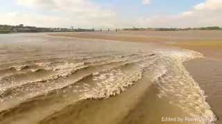 Amazing drone footage flying along with the Mersey River tidal bore [upl. by Godrich]