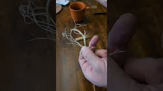 Twisting sinew into rope for part of a sculpture [upl. by George]