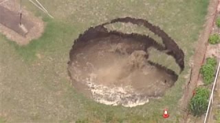 Giant Sinkhole Opens in Backyard [upl. by Nyltiac688]