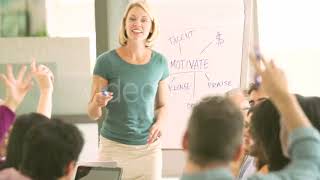 Businesswoman Leading Brainstorming Session With Colleagues 7  Stock Footage from Videohive [upl. by Bolling994]