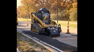 Cat® Power Box Rake Attachment at Work [upl. by Pawsner202]